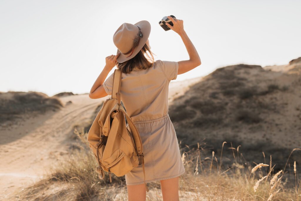 Girl with camera hobbies is your self- care must. creamy beige tones 